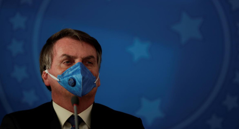 Coronavirus, Brasil, Bolsonaro con barbijo, REUTERS