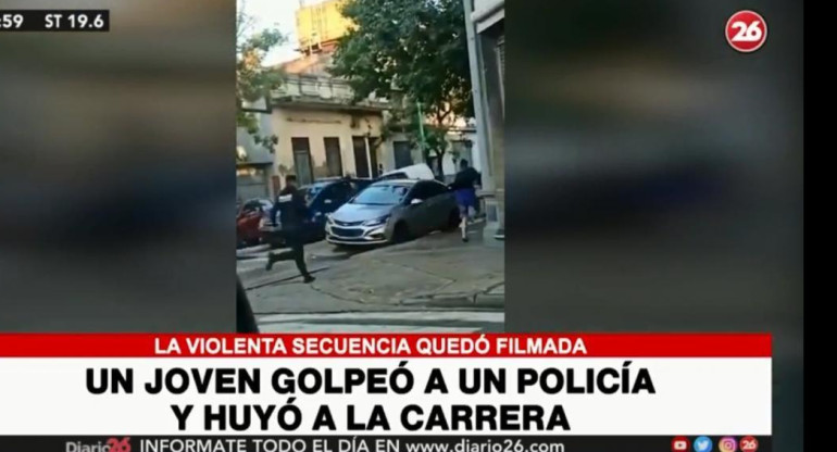 Un joven golpeó a un policía y huyó a la carrera, Video Canal 26