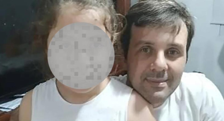 Pablo Damián Grottini junto a su hija. Foto: NA.