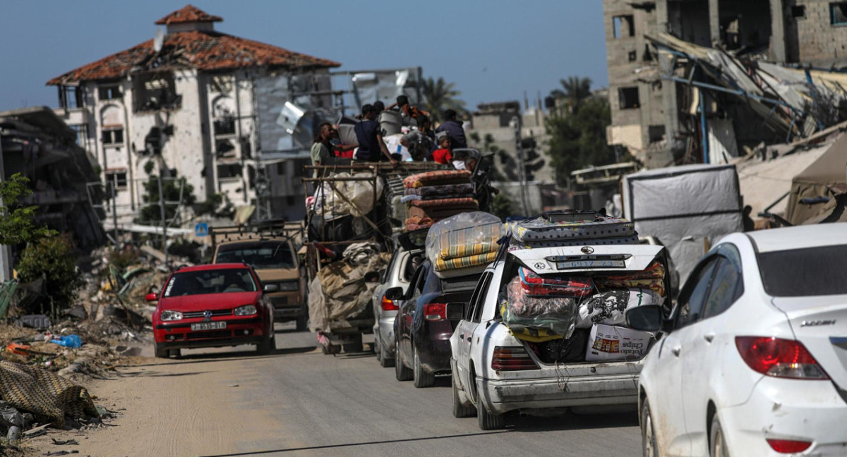 Gazatíes huyen de Rafah. Foto: EFE.