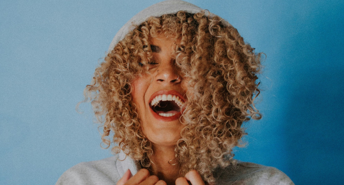 Persona feliz. Foto Unsplash.