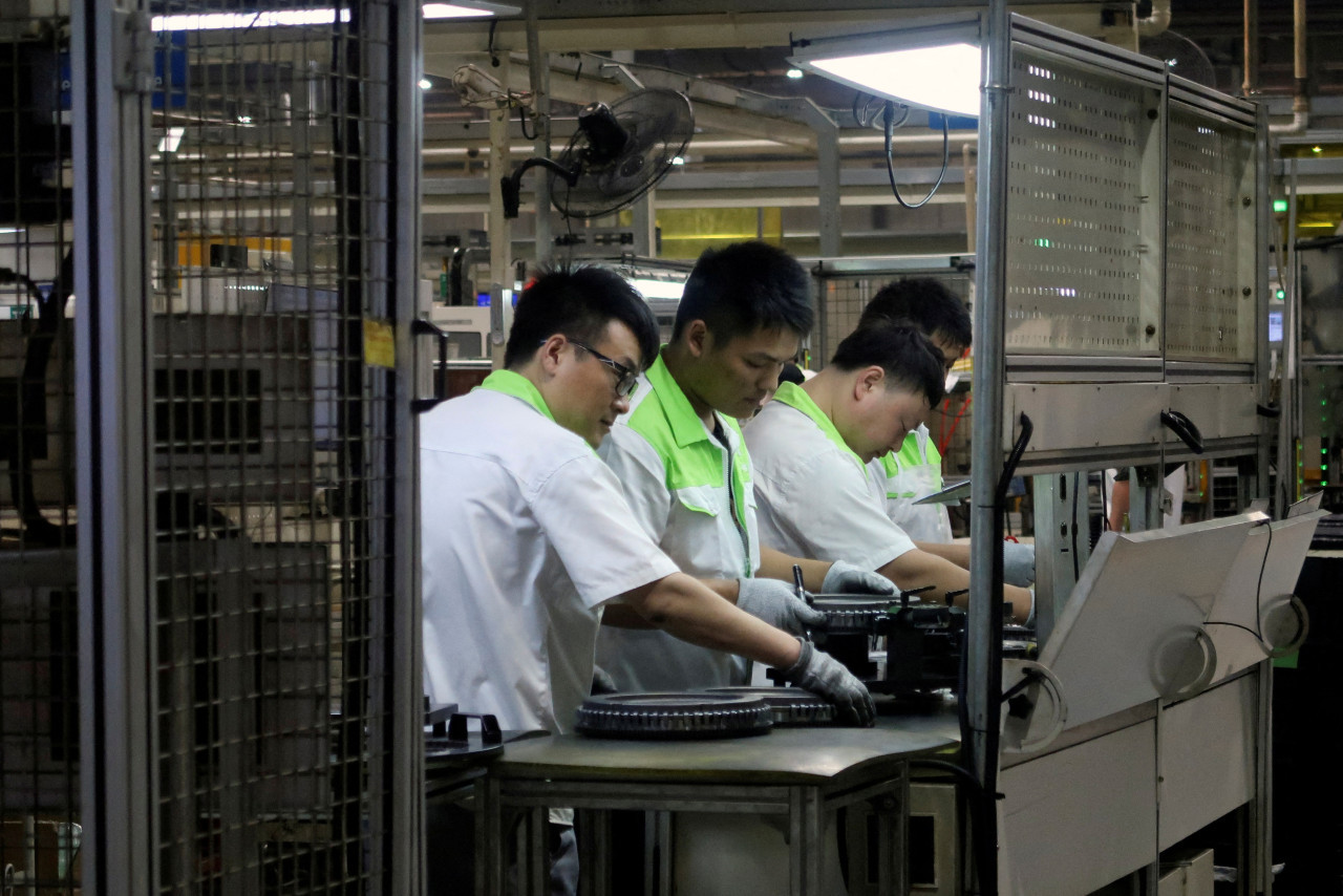 Trabajadores en China. Foto: REUTERS.