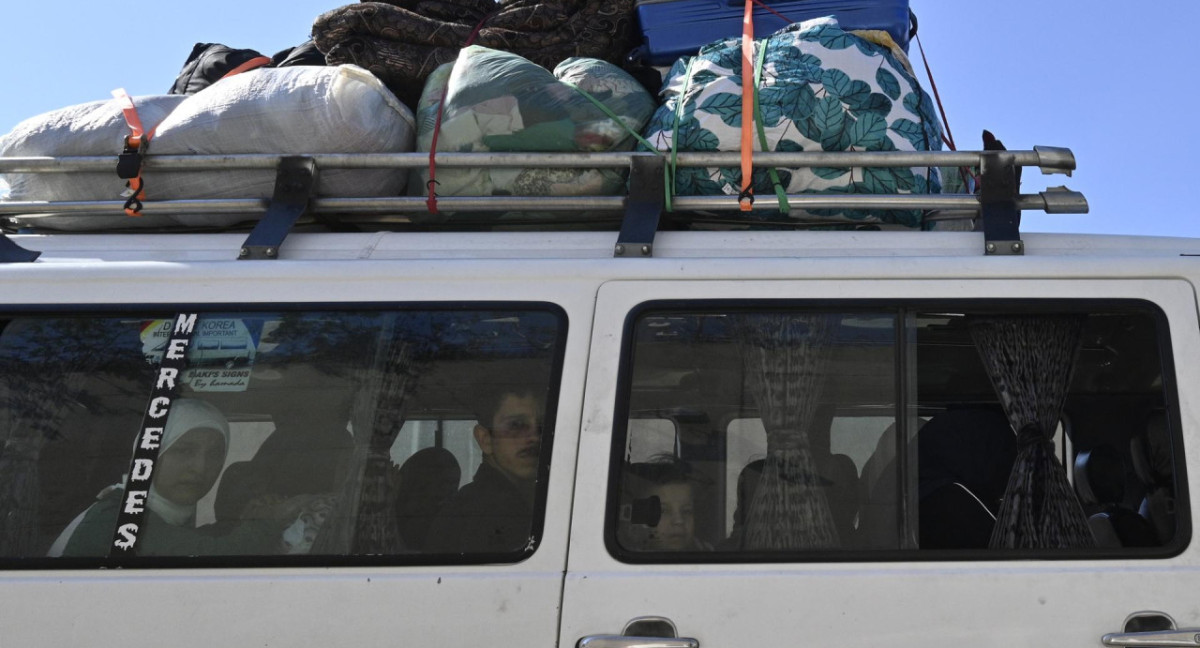 Miles de personas en el Líbano huyen a Siria en medio de los ataques israelíes. Foto: EFE.